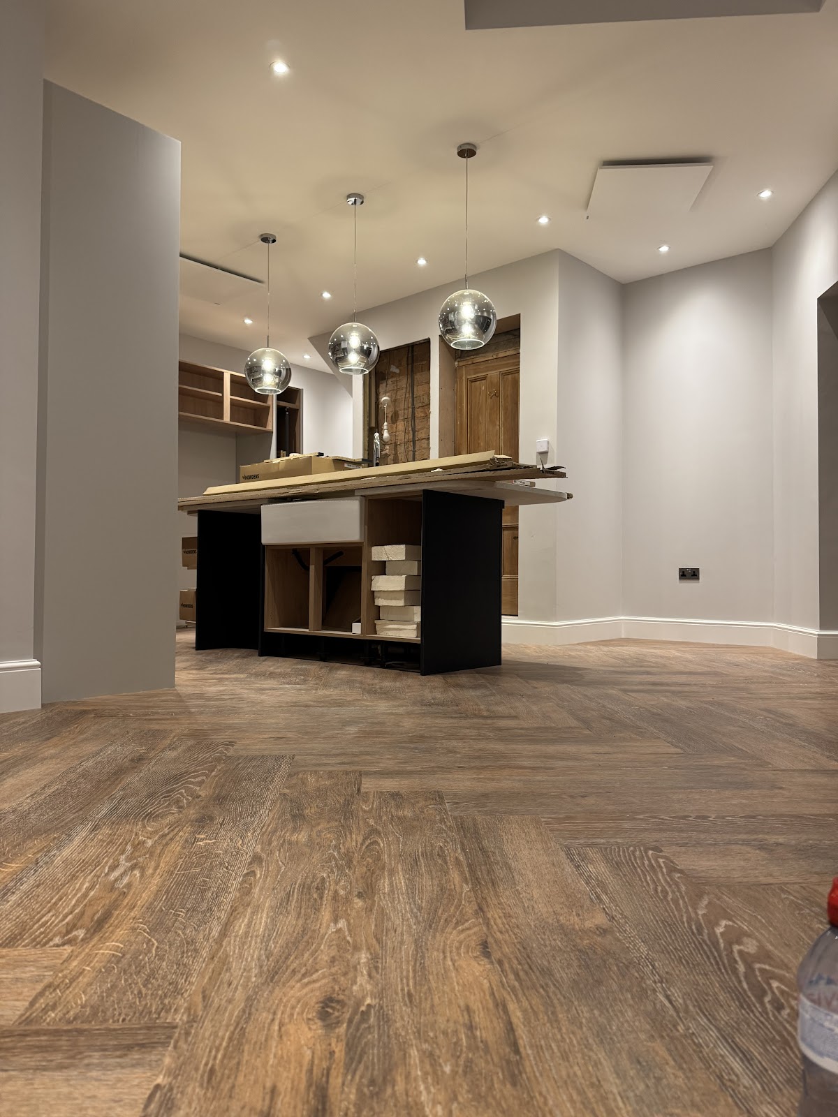 Rustic oak herringbone, open-plan kitchen