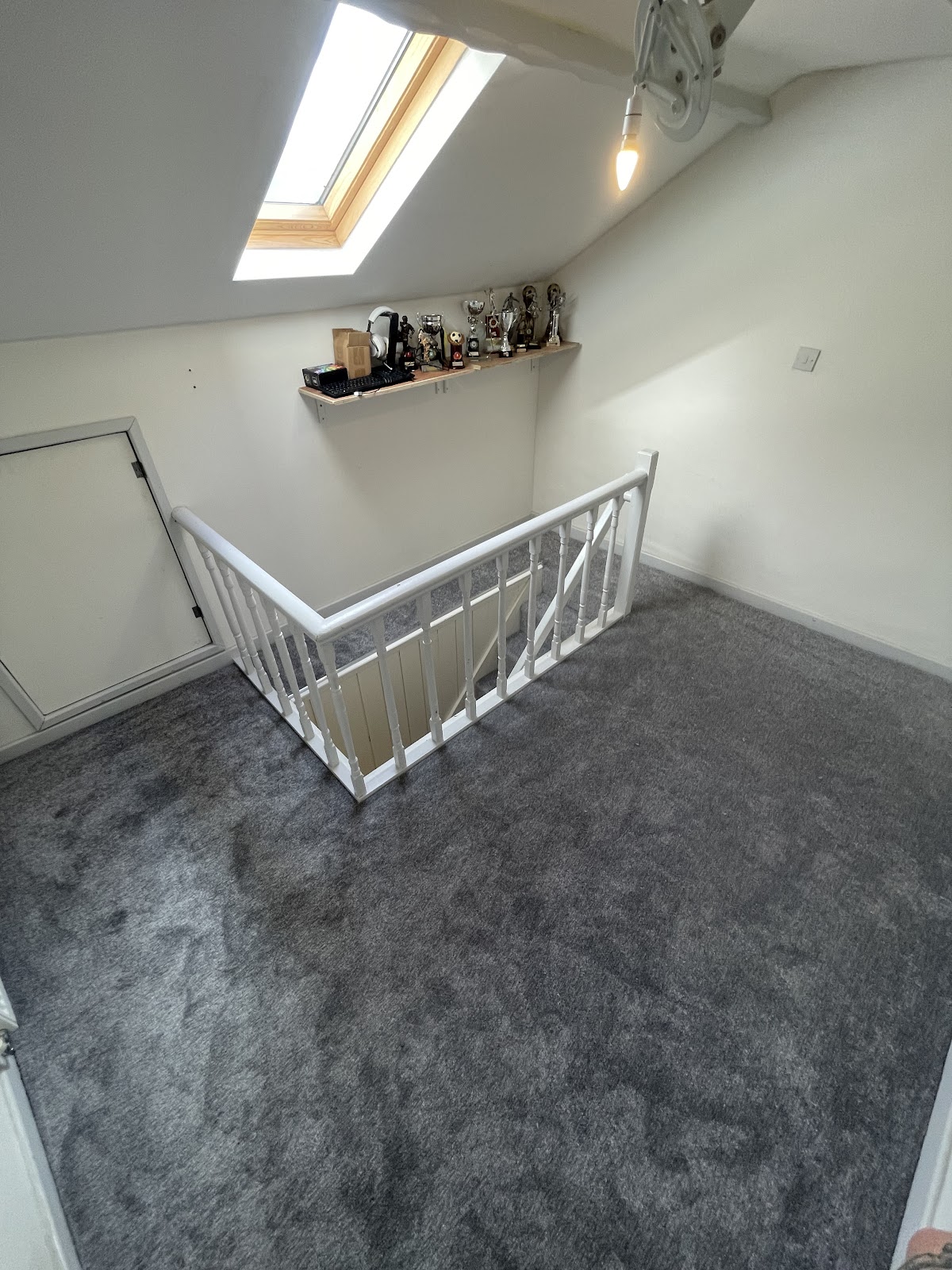 Soft grey carpet, loft room
